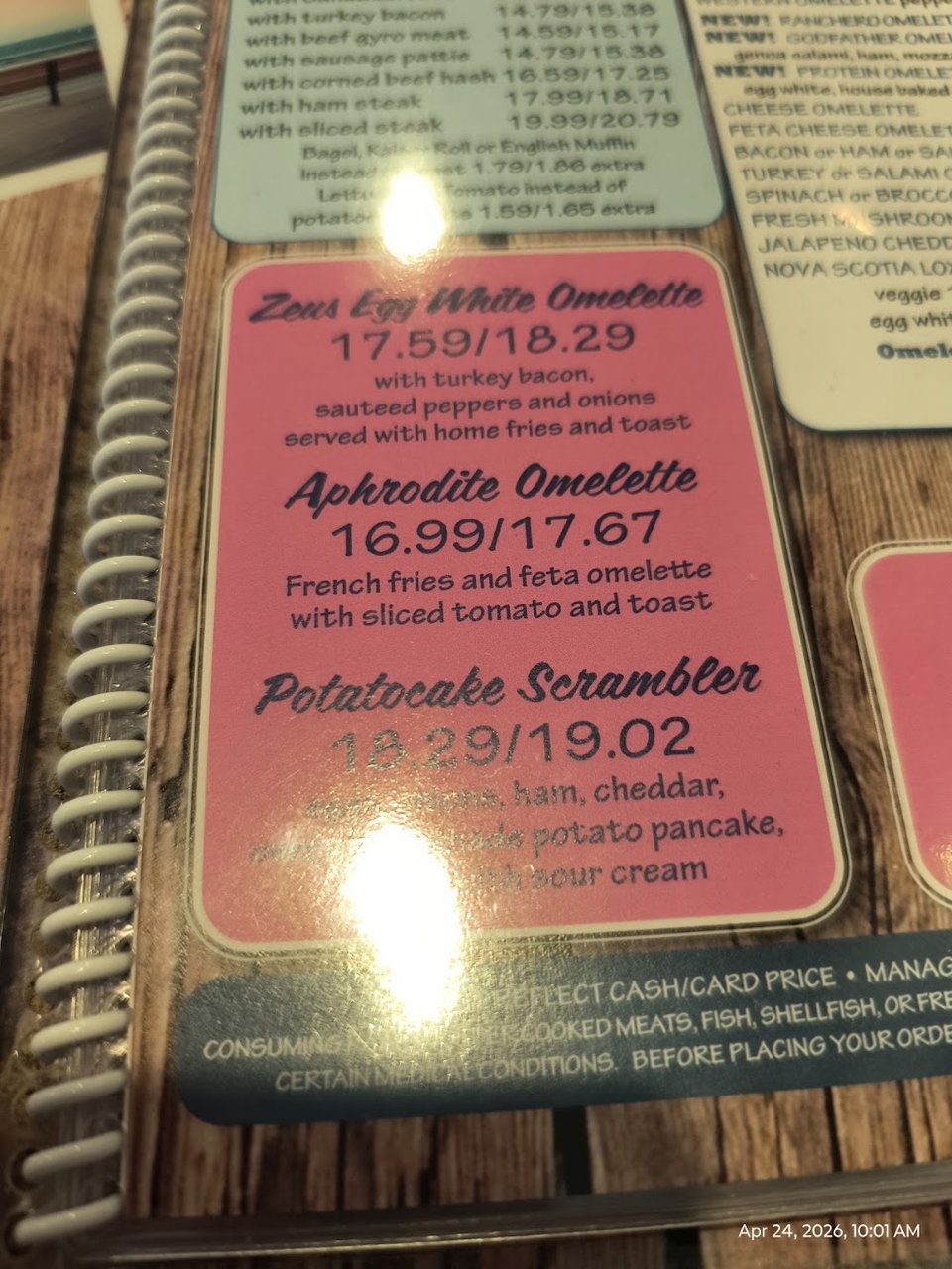 Printed menu beside coffee and dessert options.